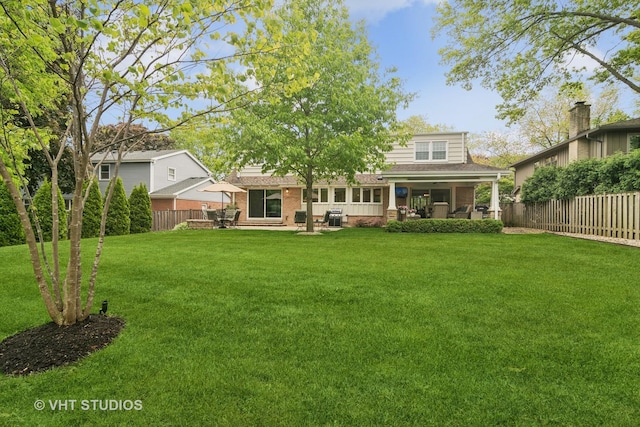 614 S Patton Ave, Arlington Heights, IL 60005 - rear view of house featuring brick siding and a patio area