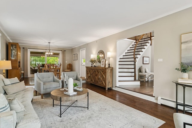 614 S Patton Ave, Arlington Heights, IL 60005 - living room with wood finished floors, stairs, ornamental molding, a chandelier, and a baseboard radiator