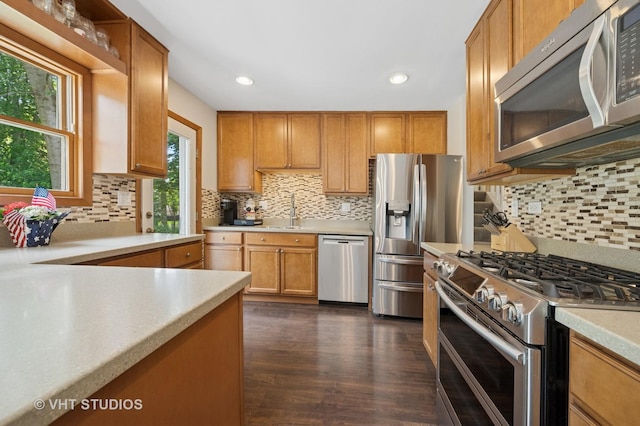 150 Red Bridge Rd, Lake Zurich, IL 60047 - kitchen featuring appliances with stainless steel finishes, plenty of natural light, light countertops, backsplash, and recessed lighting