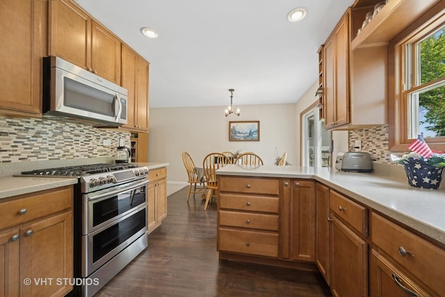 150 Red Bridge Rd, Lake Zurich, IL 60047 - kitchen with appliances with stainless steel finishes, brown cabinetry, light countertops, tasteful backsplash, and recessed lighting