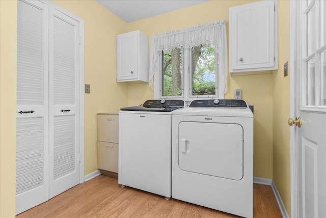 1025 Oxford Rd, Deerfield, IL 60015 - washroom with washing machine and dryer, light wood-style floors, cabinet space, and baseboards