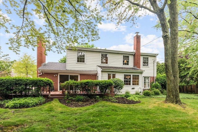 1025 Oxford Rd, Deerfield, IL 60015 - rear view of house featuring a chimney, brick siding, a deck, and a shingled roof