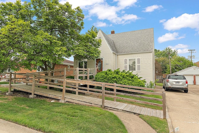 18122 Wentworth Ave, Lansing, IL 60438 - view of front of home featuring a shingled roof, a chimney, and a garage