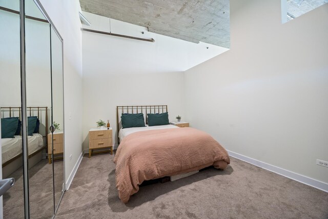 320 E 21st St Unit 402, Chicago, IL 60616 - carpeted bedroom featuring a closet and baseboards