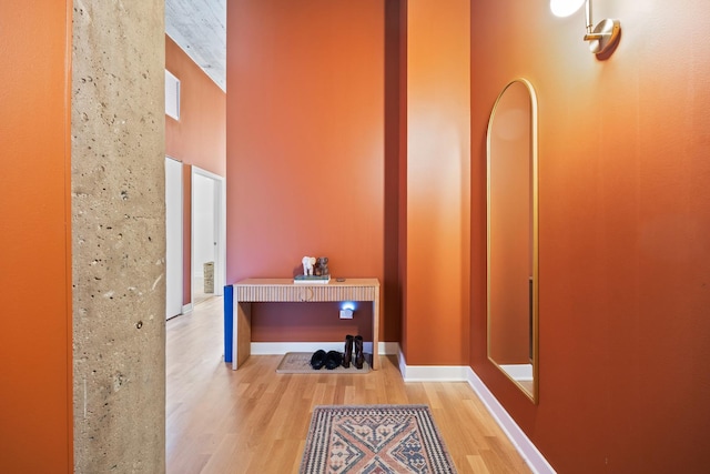 320 E 21st St Unit 402, Chicago, IL 60616 - corridor featuring wood finished floors and a towering ceiling