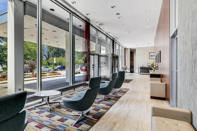 1700 E 56th St Unit 904, Chicago, IL 60637 - community lobby with a wall of windows and recessed lighting