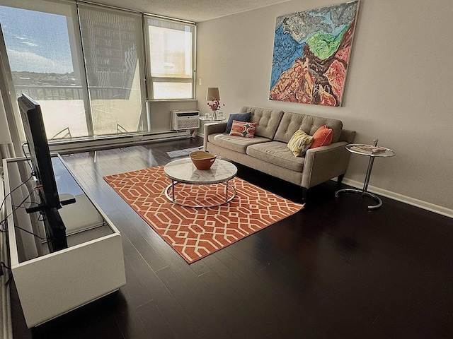 2740 N Pine Grove Ave Unit 9B, Chicago, IL 60614 - living room featuring wood finished floors, a wall mounted AC, and baseboards