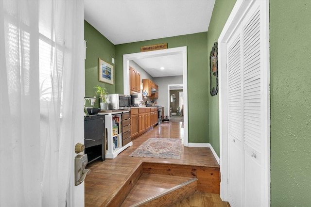 509 S Main St, Homer, IL 61849 - hall with wood finished floors and baseboards