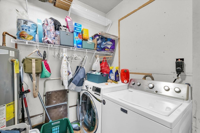 509 S Main St, Homer, IL 61849 - laundry area with washing machine and clothes dryer and gas water heater
