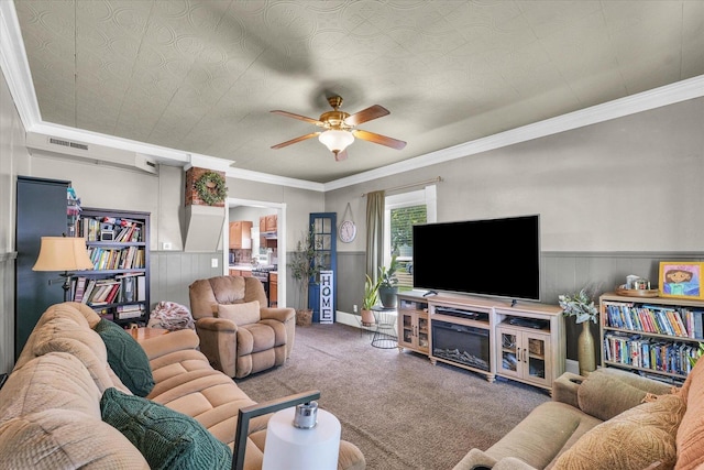 509 S Main St, Homer, IL 61849 - carpeted living area with a ceiling fan, wainscoting, and crown molding
