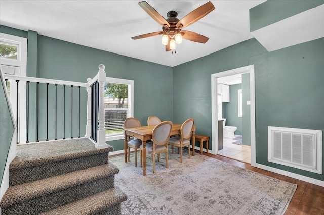 509 S Main St, Homer, IL 61849 - dining room with a ceiling fan, baseboards, stairway, and wood finished floors