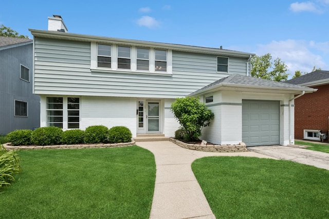 2109 Cummings Ln, Flossmoor, IL 60422 - view of front of home with a garage, concrete driveway, a front lawn, and a chimney