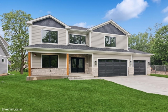 1527 N Louise Ln, Palatine, IL 60067 - view of front facade featuring driveway, brick siding, an attached garage, french doors, and a shingled roof