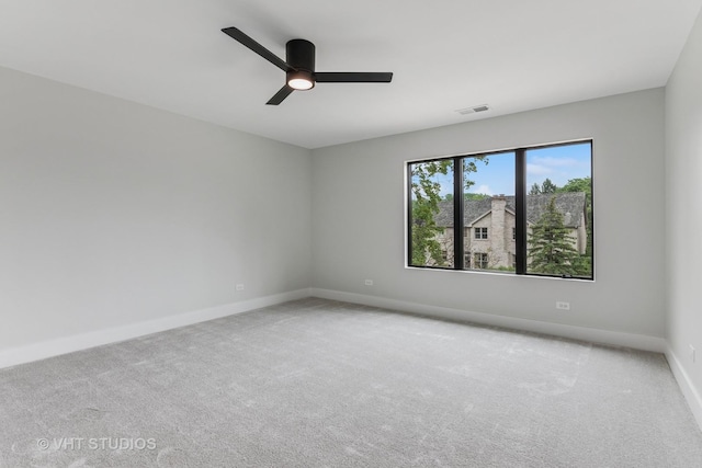 1527 N Louise Ln, Palatine, IL 60067 - spare room featuring carpet flooring and a ceiling fan