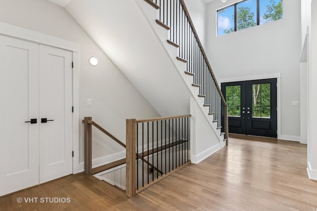 1527 N Louise Ln, Palatine, IL 60067 - entrance foyer with wood finished floors, healthy amount of natural light, lofted ceiling, and french doors