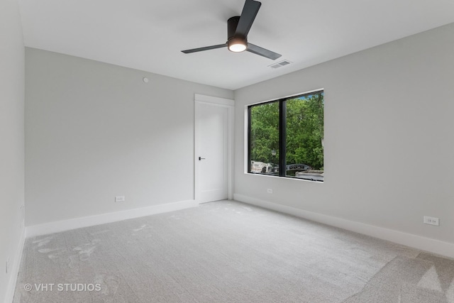 1527 N Louise Ln, Palatine, IL 60067 - carpeted spare room featuring a ceiling fan and baseboards