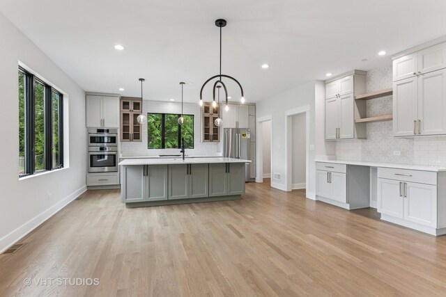 1527 N Louise Ln, Palatine, IL 60067 - kitchen with open shelves, stainless steel appliances, healthy amount of natural light, tasteful backsplash, and recessed lighting
