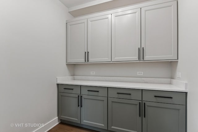 1527 N Louise Ln, Palatine, IL 60067 - bar area with dark wood-style floors and baseboards