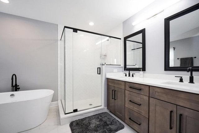 6704 Whisper Glen Dr, Plainfield, IL 60586 - bathroom with a shower stall, double vanity, a freestanding tub, marble look tiles, and recessed lighting