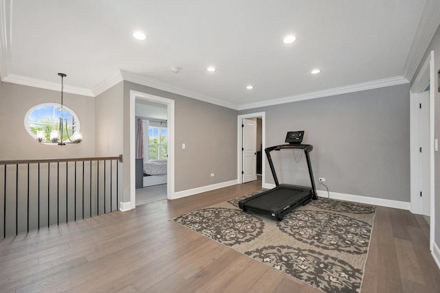 6704 Whisper Glen Dr, Plainfield, IL 60586 - workout area featuring a chandelier, wood finished floors, crown molding, and recessed lighting