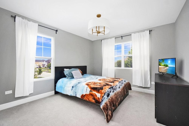 6704 Whisper Glen Dr, Plainfield, IL 60586 - bedroom with carpet floors and a chandelier