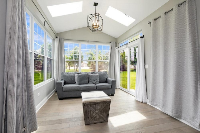 6704 Whisper Glen Dr, Plainfield, IL 60586 - sunroom / solarium with a skylight, wood-type flooring, lofted ceiling, and a chandelier