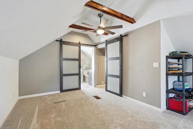 404 Vale Ave N, Rockford, IL 61107 - bonus room featuring a barn door, carpet floors, and ceiling fan