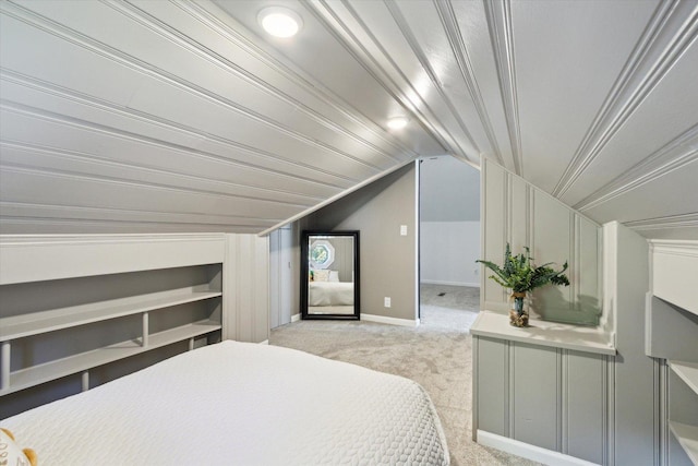 404 Vale Ave N, Rockford, IL 61107 - bedroom with light carpet, vaulted ceiling, and baseboards