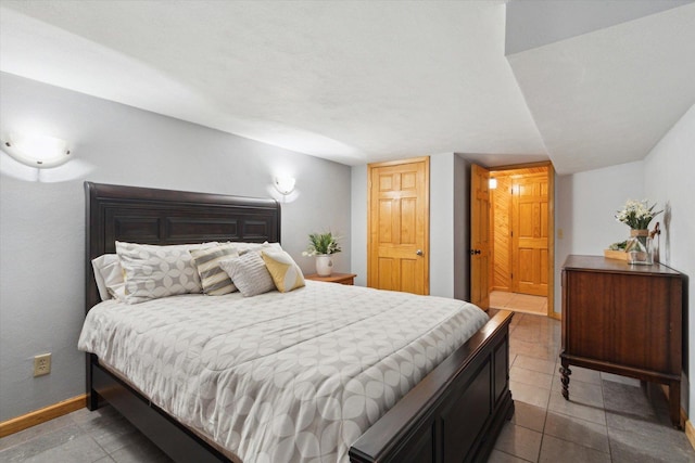 404 Vale Ave N, Rockford, IL 61107 - bedroom featuring baseboards and tile patterned flooring