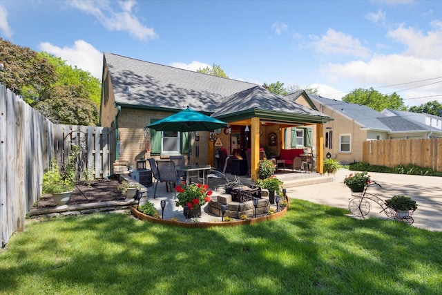 404 Vale Ave N, Rockford, IL 61107 - rear view of property with a patio area, a shingled roof, brick siding, and outdoor lounge area