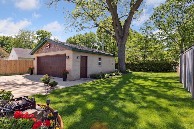 404 Vale Ave N, Rockford, IL 61107 - view of home's exterior with brick siding, a garage, and an outdoor structure