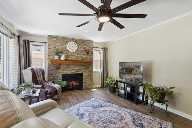 404 Vale Ave N, Rockford, IL 61107 - living area with healthy amount of natural light, baseboards, ceiling fan, wood finished floors, and ornamental molding