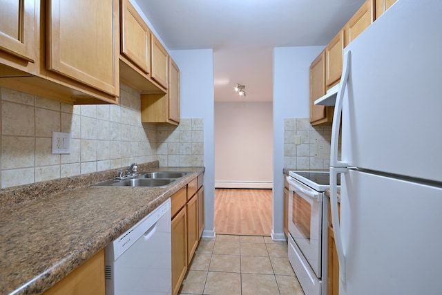 1806 Hemlock Pl Unit 105, Schaumburg, IL 60173 - kitchen with white appliances, a sink, a baseboard radiator, tasteful backsplash, and light tile patterned floors