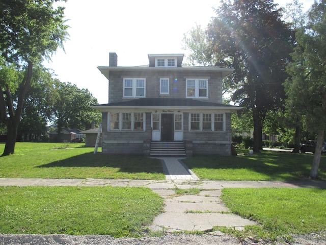 312 Union St, Joliet, IL 60433 - traditional style home with a front lawn and a chimney