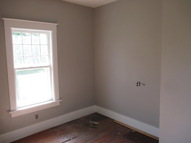 312 Union St, Joliet, IL 60433 - empty room featuring dark wood-type flooring and baseboards
