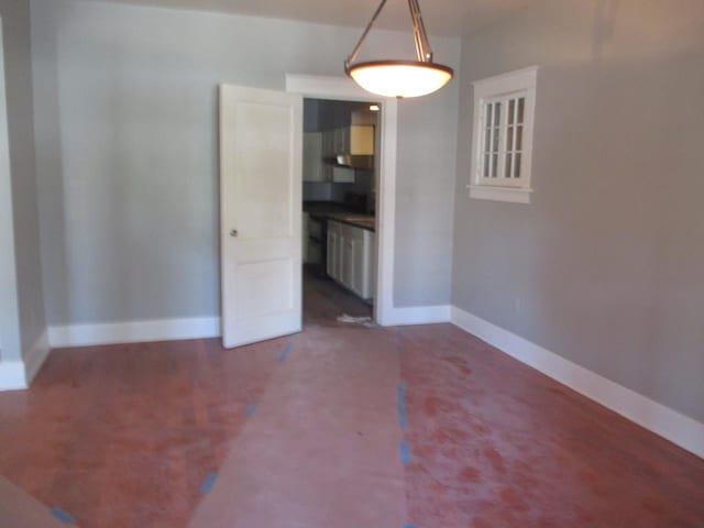 312 Union St, Joliet, IL 60433 - unfurnished dining area featuring baseboards