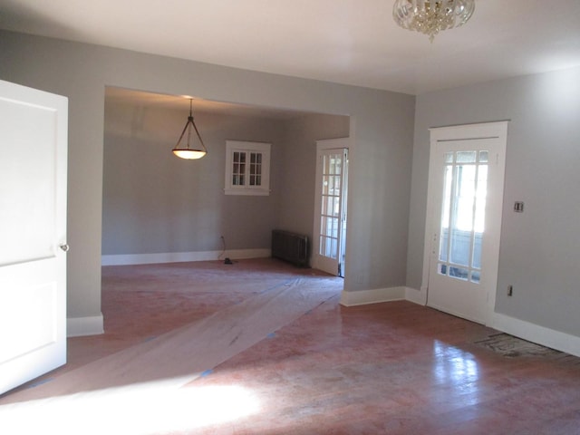 312 Union St, Joliet, IL 60433 - empty room featuring baseboards and radiator heating unit