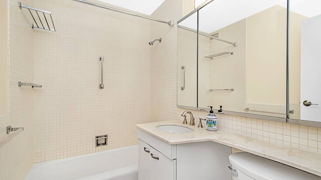 400 E Randolph St Unit 3321, Chicago, IL 60601 - bathroom with bathing tub / shower combination, decorative backsplash, vanity, and toilet