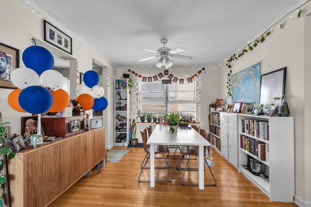 530 Michigan Ave Unit 3E, Evanston, IL 60202 - dining room with ceiling fan and light wood finished floors