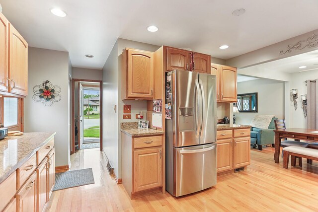11025 S Kolmar Ave, Oak Lawn, IL 60453 - kitchen with stainless steel fridge with ice dispenser, light wood-style flooring, light stone countertops, recessed lighting, and light brown cabinets