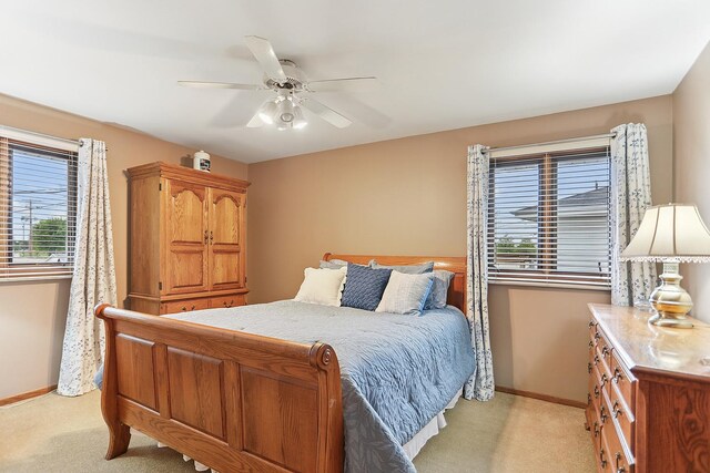 11025 S Kolmar Ave, Oak Lawn, IL 60453 - bedroom featuring light colored carpet, baseboards, and a ceiling fan