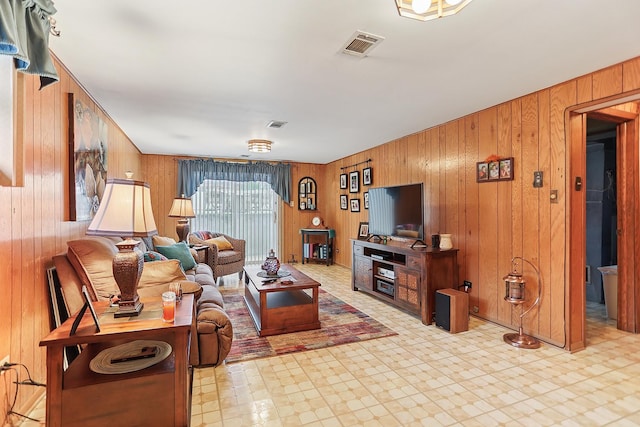 11025 S Kolmar Ave, Oak Lawn, IL 60453 - living room with wooden walls and tile patterned floors