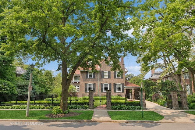 539 N E Ave, Oak Park, IL 60302 - view of front of house featuring a fenced front yard and brick siding