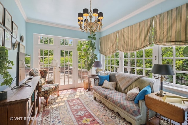 539 N E Ave, Oak Park, IL 60302 - sunroom with french doors, plenty of natural light, and a chandelier