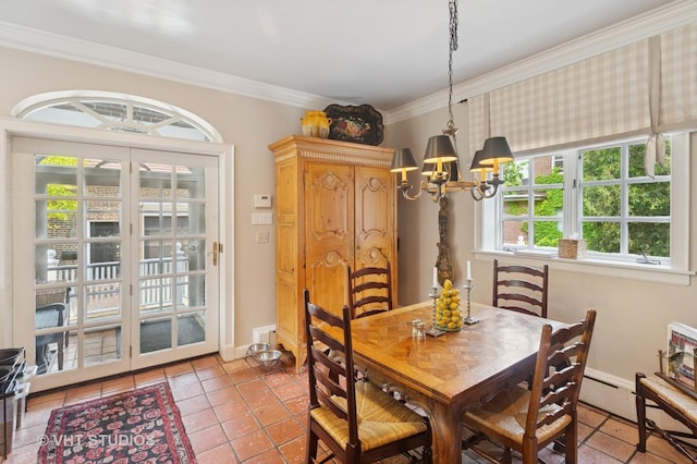 539 N E Ave, Oak Park, IL 60302 - dining area featuring a chandelier, ornamental molding, and tile patterned floors
