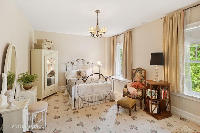 539 N E Ave, Oak Park, IL 60302 - bedroom featuring multiple windows and a chandelier