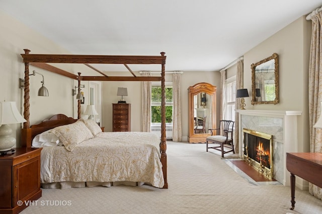 539 N E Ave, Oak Park, IL 60302 - carpeted bedroom with a high end fireplace and radiator heating unit