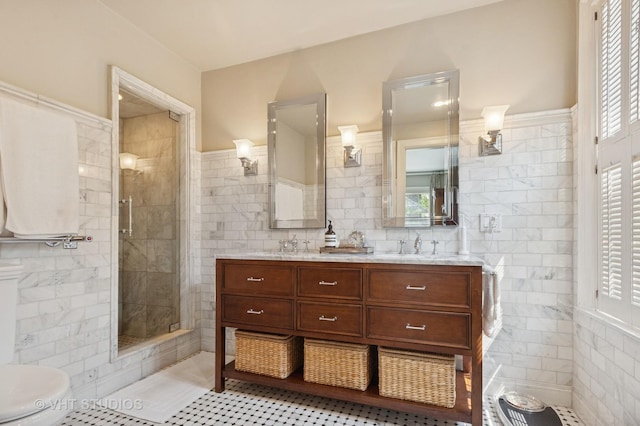 539 N E Ave, Oak Park, IL 60302 - full bath featuring tile walls, a stall shower, double vanity, healthy amount of natural light, and tile patterned floors