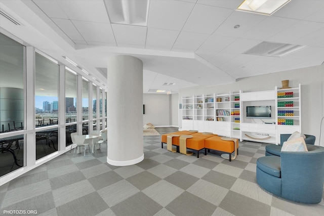 1201 S Prairie Ave Unit 1505, Chicago, IL 60605 - carpeted living room with a drop ceiling, baseboards, and a view of city