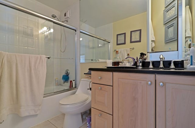 405 N Wabash Ave Unit 3403, Chicago, IL 60611 - bathroom with tile patterned floors, toilet, enclosed tub / shower combo, and vanity